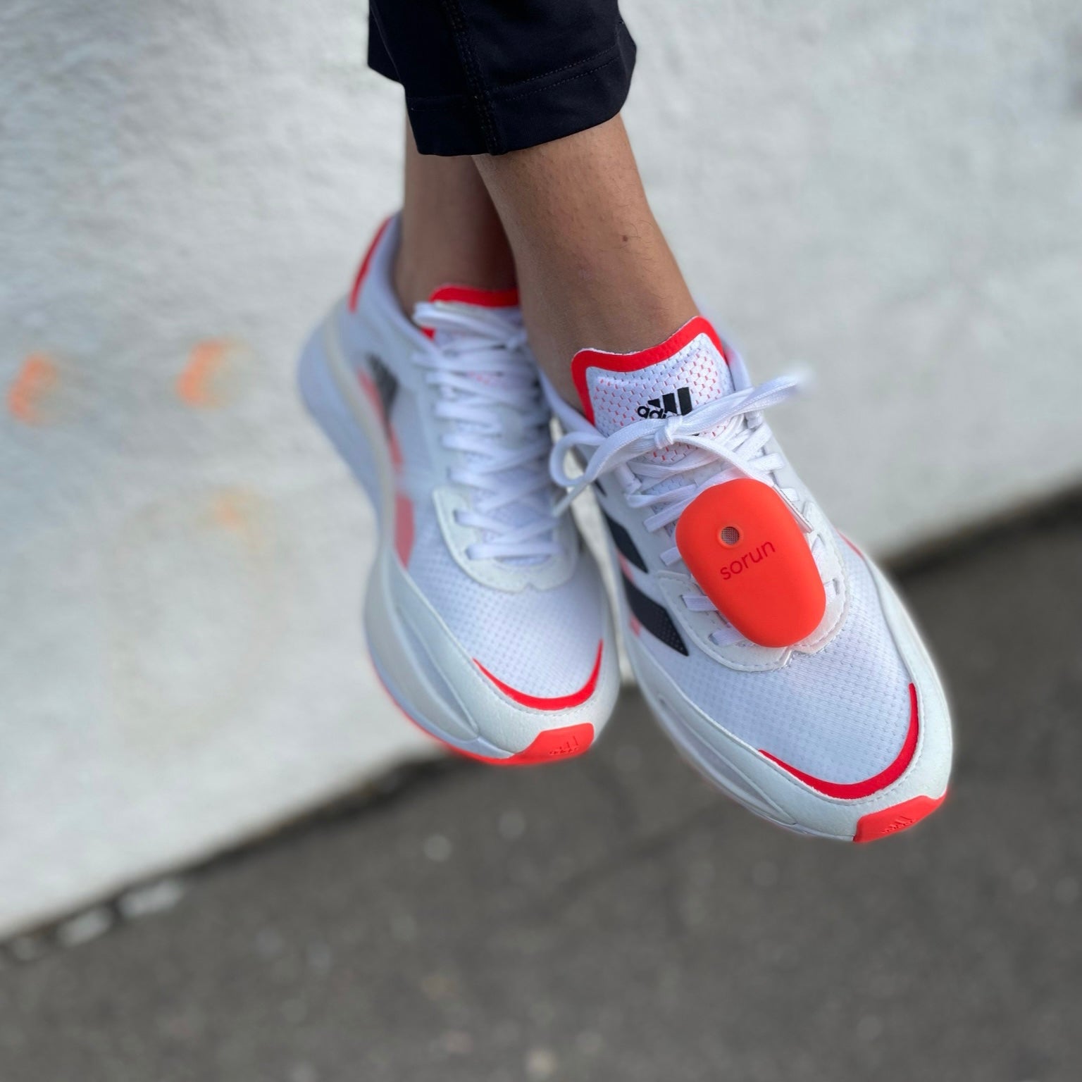 Sorun One Neon Coral - Shoe-mounted personal alarm on Adidas Adizero Boston 10 Women, Size: 38 EUR